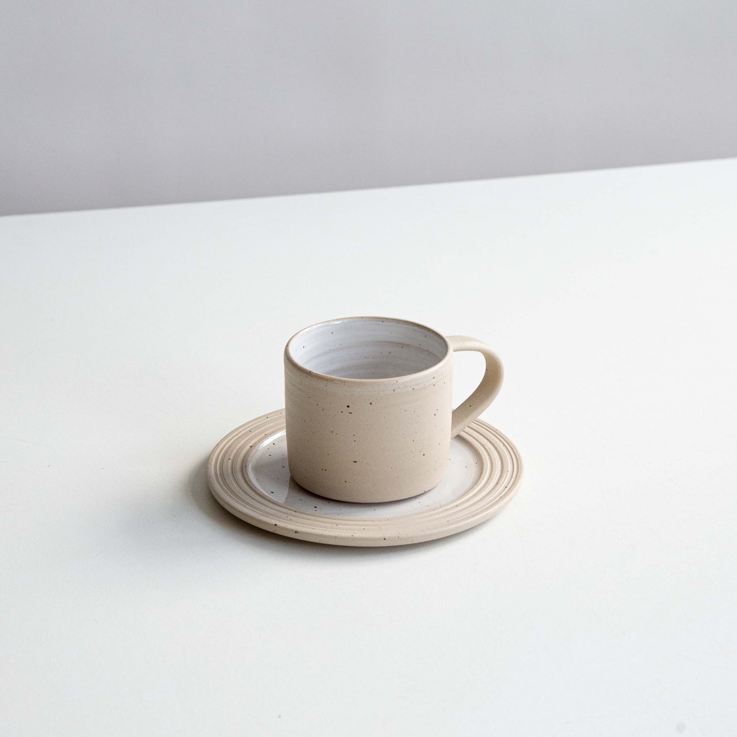 CUP WHITE SPECKLED & SAUCER